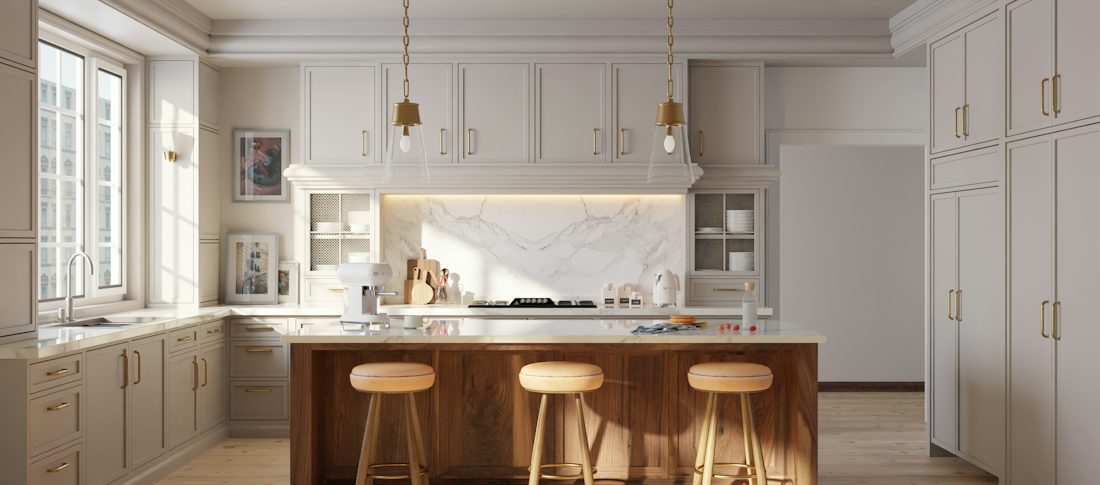 Finished kitchen with a wood island, bar stools, and white cabinets